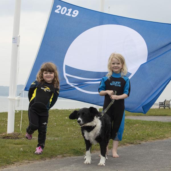 The Lord Moyor of Fingal Cllr Anthony Lavin is joined by Councillors and The Red Hot Mommas Swimming Group to celebrate Portmarnack Beach receiving a Blue Flag.