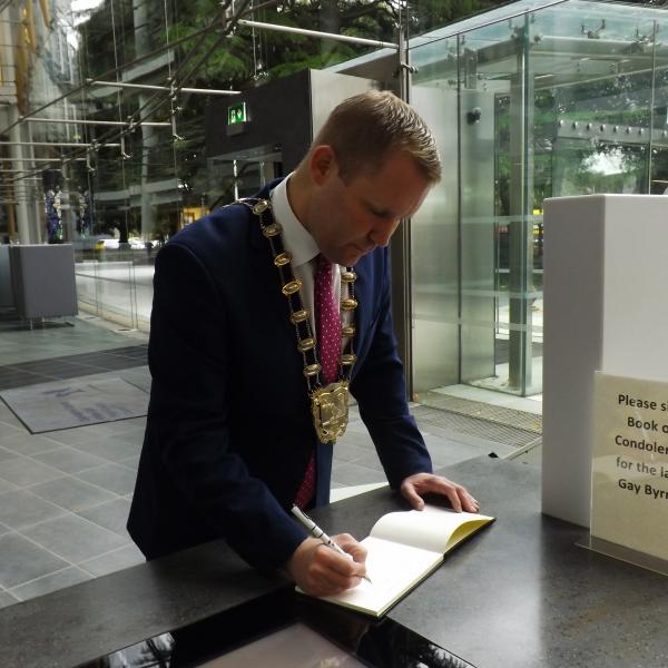 Mayor Signing Book of Condolence for Gay Byrne in Swords