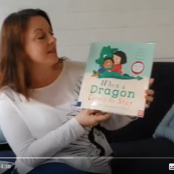 Laura reading when a dragon comes to stay