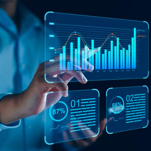 Image of a finger pointing at a graph on a dashboard