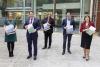 Minister for Housing, Local Government and Heritage, Darragh O'Brien TD presents a copy of the Design Manual for Quality Housing, and a Review of Pre-Construction Processes for Social Housing Construction and Mixed Tenure Projects to Mayor of Fingal Cllr Seána Ó Rodaigh, Fingal County Architect Fionnuala May, Cllr Robert. O'Donoghue, Chair of the Housing Strategic Policy Committee and Fingal County Council Chief Executive AnnMarie Farrelly. 