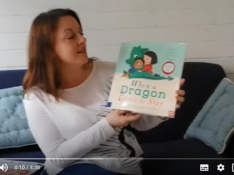 Laura reading when a dragon comes to stay