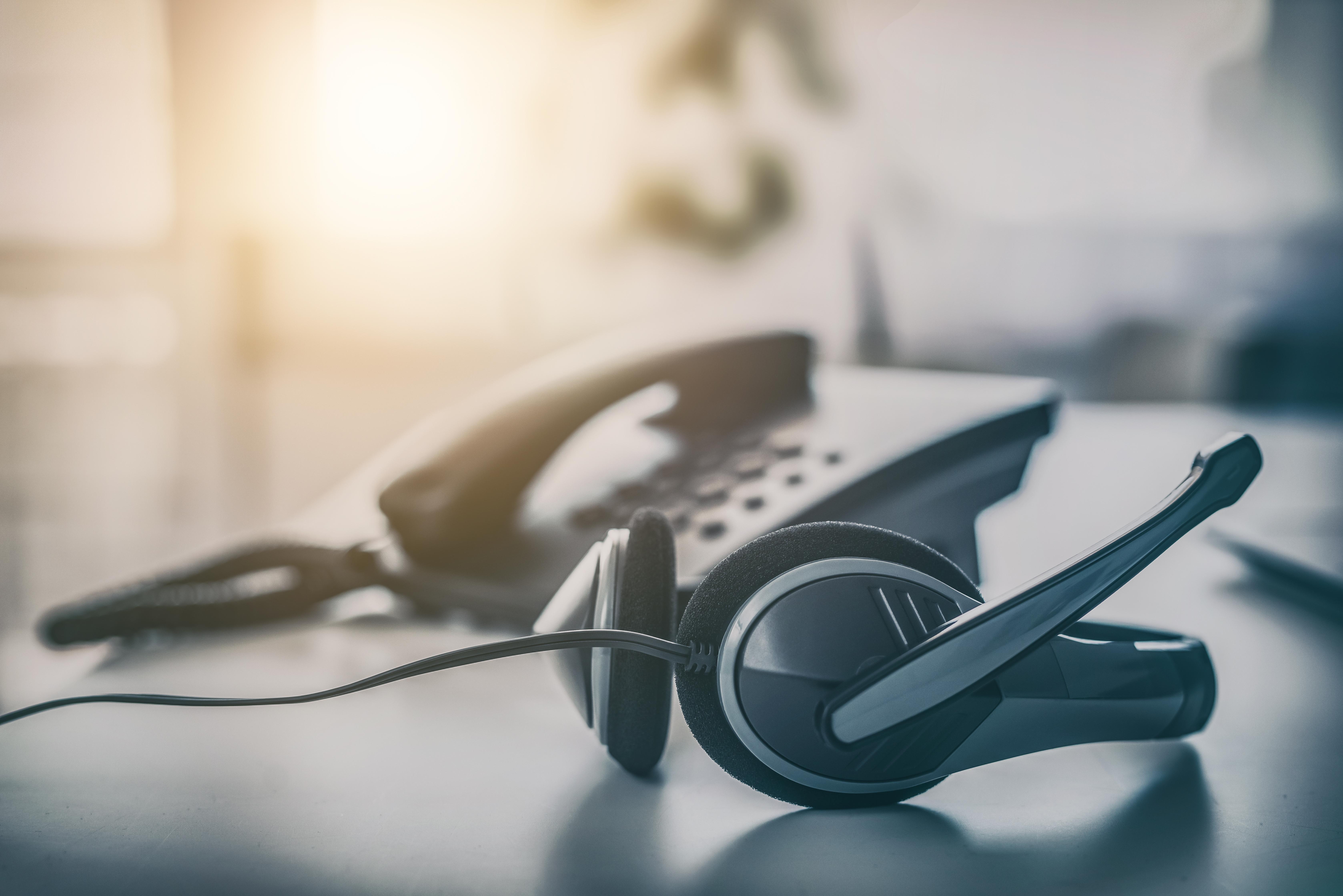 Photo of a phone and a headset